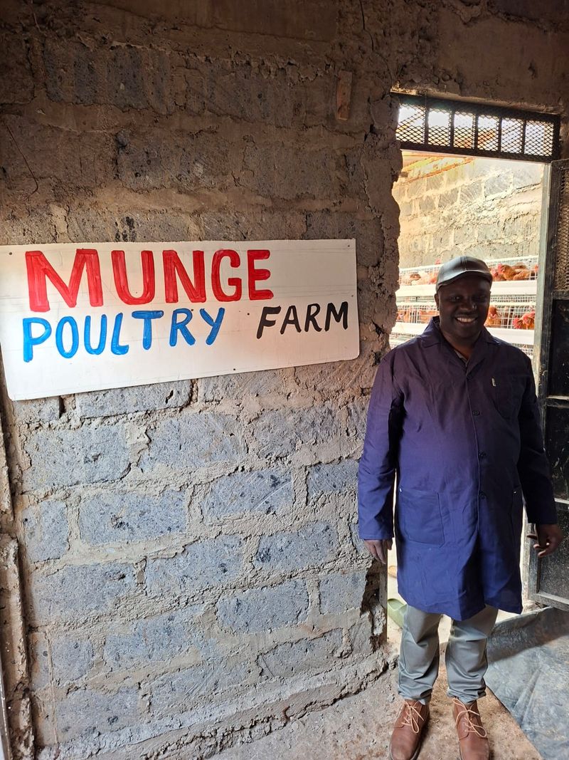 Munge Poultry Farm sign at the farm entrance